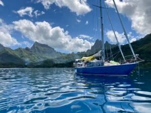 About Us Yacht at anchor in Moorea